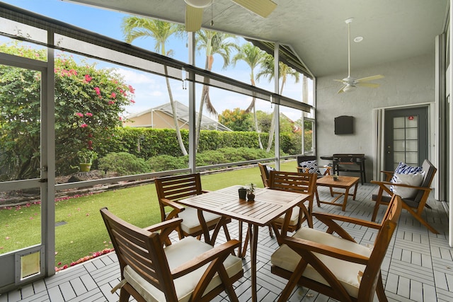 1644 Oak Berry Cir, Wellington, FL 33414 - sunroom with ceiling fan, outdoor dining space, and vaulted ceiling