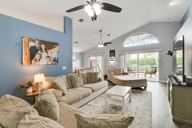 1644 Oak Berry Cir, Wellington, FL 33414 - living room with a ceiling fan, vaulted ceiling, and wood finished floors