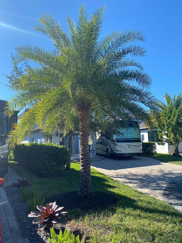 view of property exterior with driveway