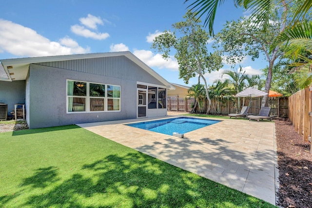 18428 Alydar Way, Boca Raton, FL 33496 - view of pool featuring a patio, cooling unit, and a sunroom