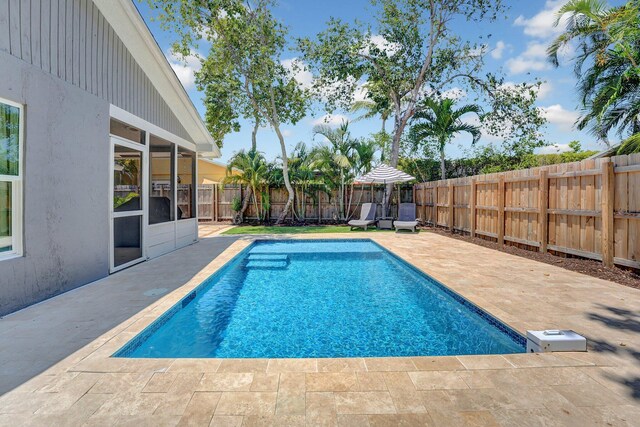 18428 Alydar Way, Boca Raton, FL 33496 - view of pool with a patio and a fenced backyard