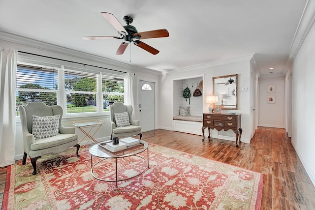 18428 Alydar Way, Boca Raton, FL 33496 - living room featuring crown molding, ceiling fan, wood finished floors, and baseboards