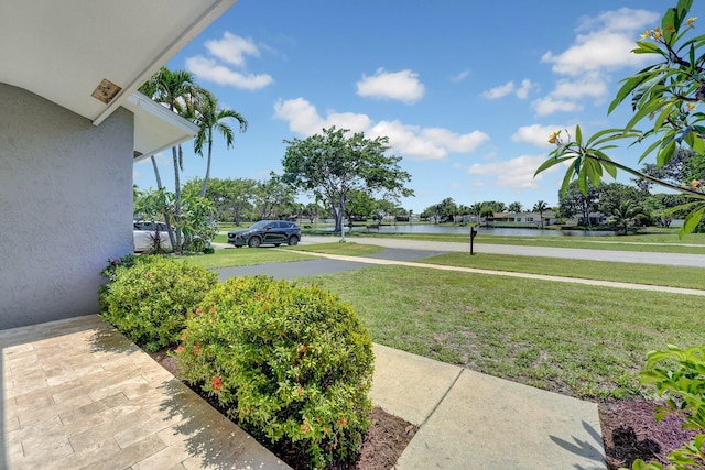 18428 Alydar Way, Boca Raton, FL 33496 - view of grassy yard featuring a water view