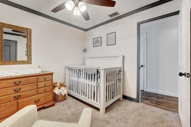 18428 Alydar Way, Boca Raton, FL 33496 - carpeted bedroom featuring crown molding, baseboards, a crib, and ceiling fan