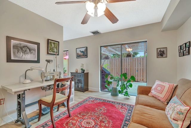 1518 15th Ln, Palm Beach Gardens, FL 33418 - office space featuring light wood finished floors, ceiling fan, and a textured ceiling