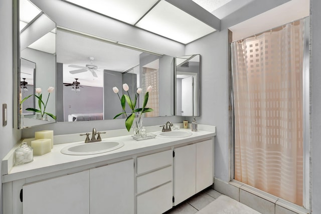 1518 15th Ln, Palm Beach Gardens, FL 33418 - full bathroom featuring double vanity, tile patterned flooring, ceiling fan, and a shower with curtain