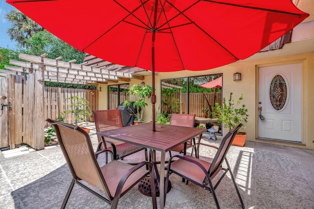 1518 15th Ln, Palm Beach Gardens, FL 33418 - fenced backyard featuring outdoor dining space, a patio, and a pergola