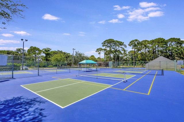 1518 15th Ln, Palm Beach Gardens, FL 33418 - view of tennis court featuring community basketball court