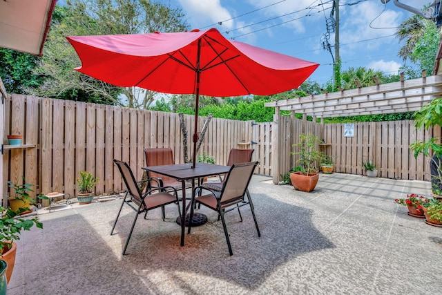 1518 15th Ln, Palm Beach Gardens, FL 33418 - fenced backyard with outdoor dining space and a patio area