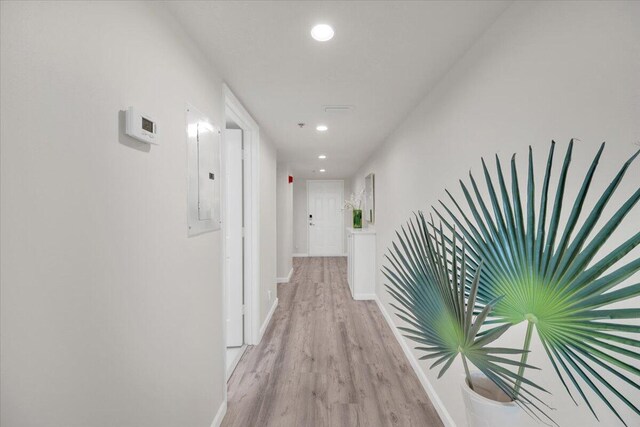 275 Palm Ave Unit B304, Jupiter, FL 33477 - corridor featuring light wood finished floors, recessed lighting, baseboards, and electric panel