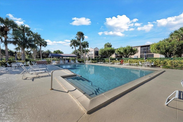 275 Palm Ave Unit B304, Jupiter, FL 33477 - community pool featuring a patio