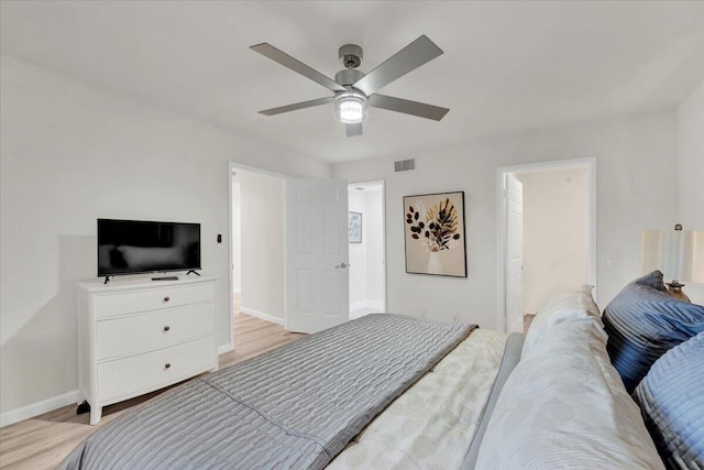 275 Palm Ave Unit B304, Jupiter, FL 33477 - bedroom featuring light wood-style floors, baseboards, and a ceiling fan