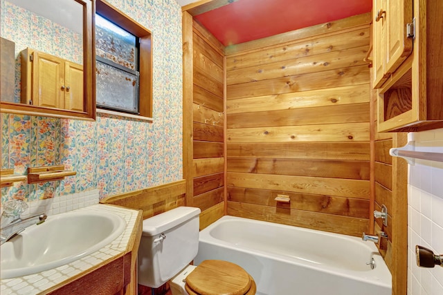 13705 Persimmon Blvd, The Acreage, FL 33411 - bathroom featuring wallpapered walls, toilet, wainscoting, and vanity