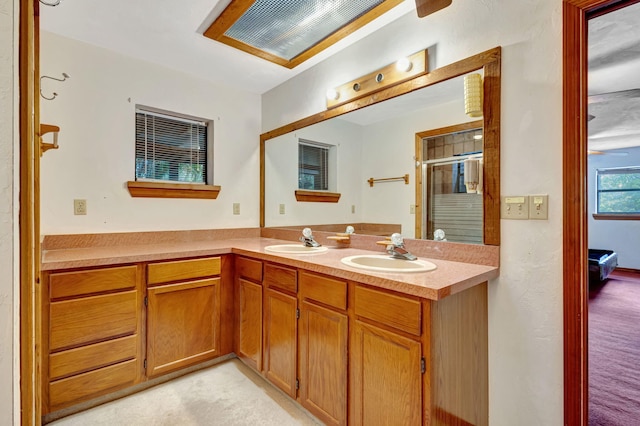 13705 Persimmon Blvd, The Acreage, FL 33411 - bathroom with a shower stall and double vanity