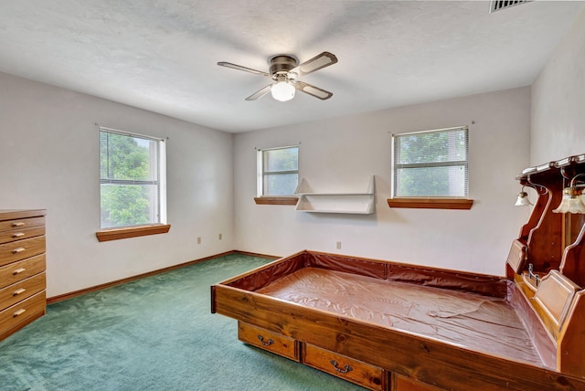 13705 Persimmon Blvd, The Acreage, FL 33411 - carpeted bedroom featuring multiple windows, baseboards, and ceiling fan
