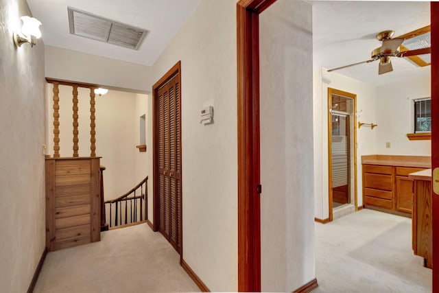 13705 Persimmon Blvd, The Acreage, FL 33411 - corridor with light carpet, an upstairs landing, and baseboards