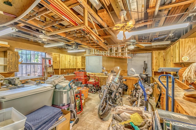 13705 Persimmon Blvd, The Acreage, FL 33411 - miscellaneous room featuring concrete flooring, ceiling fan, and wooden walls