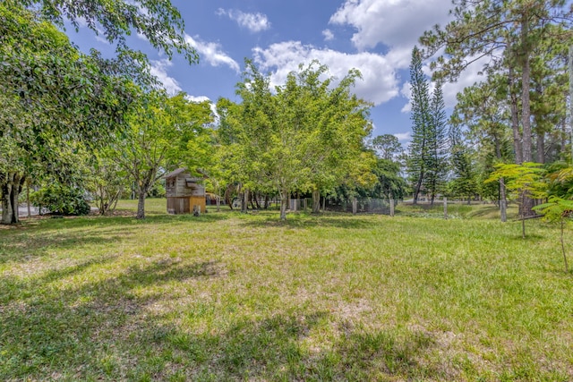13705 Persimmon Blvd, The Acreage, FL 33411 - view of yard featuring a barn and an outdoor structure