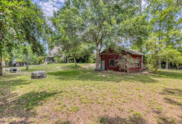 13705 Persimmon Blvd, The Acreage, FL 33411 - view of green lawn with an outdoor structure