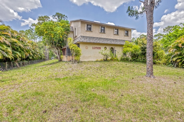 13705 Persimmon Blvd, The Acreage, FL 33411 - view of home's exterior with stucco siding