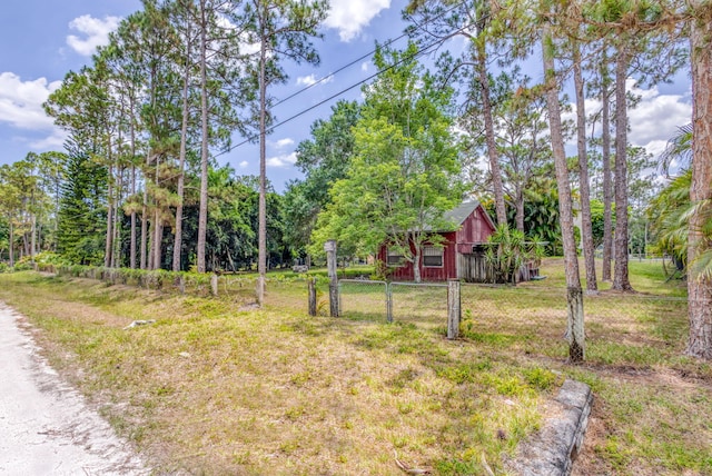 13705 Persimmon Blvd, The Acreage, FL 33411 - view of yard featuring an outbuilding