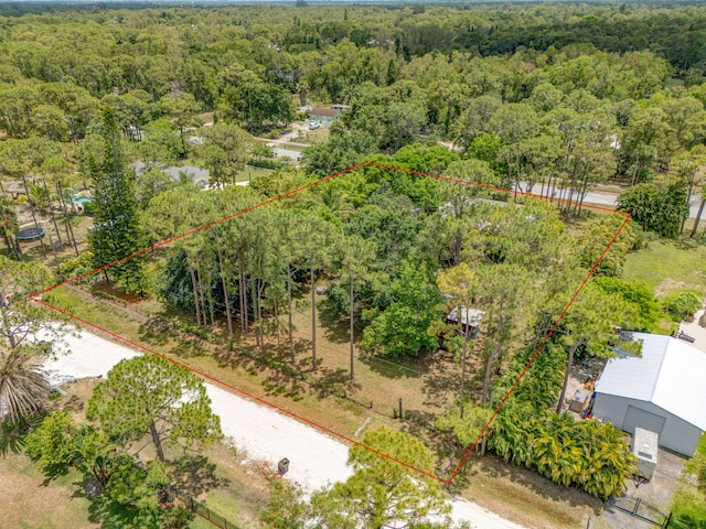 13705 Persimmon Blvd, The Acreage, FL 33411 - aerial view of property's location with a forest and property boundaries highlighted