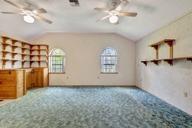 13705 Persimmon Blvd, The Acreage, FL 33411 - unfurnished living room with ceiling fan, vaulted ceiling, carpet floors, and healthy amount of natural light