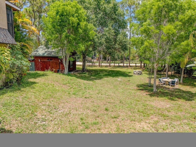 13705 Persimmon Blvd, The Acreage, FL 33411 - view of grassy yard with an outdoor structure