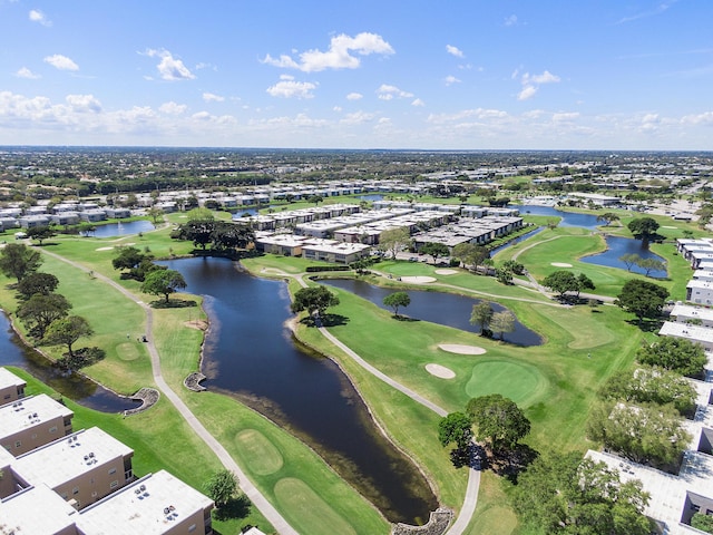 521 Saxony K, Delray Beach, FL 33446 - aerial view of property and surrounding area featuring a nearby body of water, a golf course, and nearby suburban area