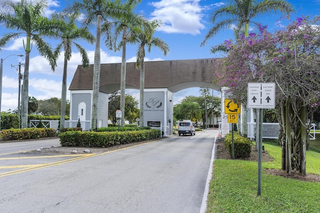 521 Saxony K, Delray Beach, FL 33446 - view of asphalt road with traffic signs and street lights