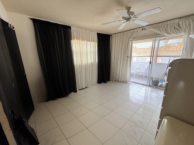 521 Saxony K, Delray Beach, FL 33446 - unfurnished room featuring ceiling fan
