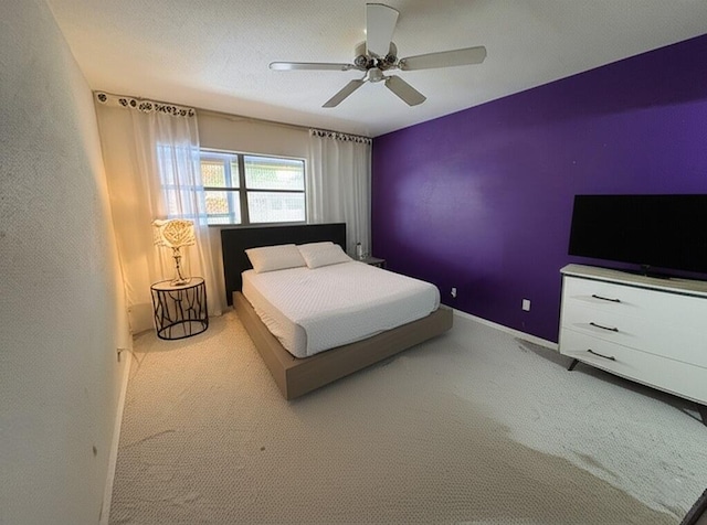 521 Saxony K, Delray Beach, FL 33446 - carpeted bedroom featuring a ceiling fan and baseboards