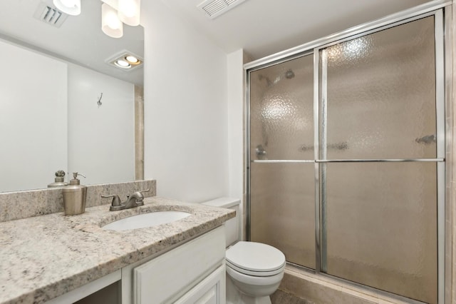 3186 Via Poinciana Unit 115, Lake Worth, FL 33467 - full bath with vanity, a shower with shower door, and toilet