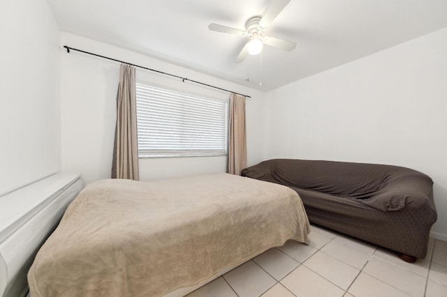 3186 Via Poinciana Unit 115, Lake Worth, FL 33467 - bedroom featuring light tile patterned floors and ceiling fan