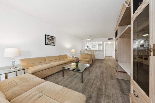 3186 Via Poinciana Unit 115, Lake Worth, FL 33467 - living area featuring ceiling fan and wood finished floors