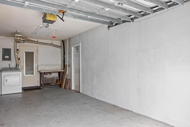 garage featuring washer / clothes dryer, electric panel, a garage door opener, and a ceiling fan