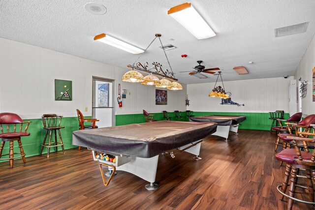 recreation room featuring billiards, wood finished floors, a textured ceiling, and ceiling fan