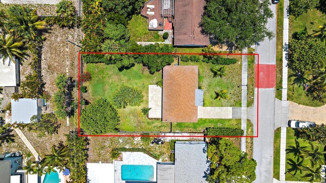 2559 Conroy Dr, North Palm Beach, FL 33403 - aerial overview of property's location with a pool area and property boundaries highlighted