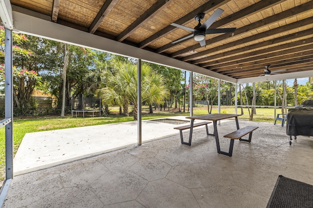 4972 S Kay St, Palm Beach Gardens, FL 33418 - view of patio featuring a trampoline, a ceiling fan, and view of scattered trees