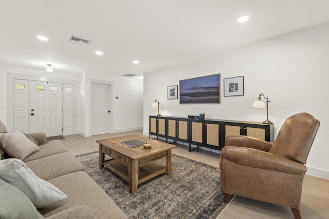 4972 S Kay St, Palm Beach Gardens, FL 33418 - living room with recessed lighting, wood finished floors, and baseboards