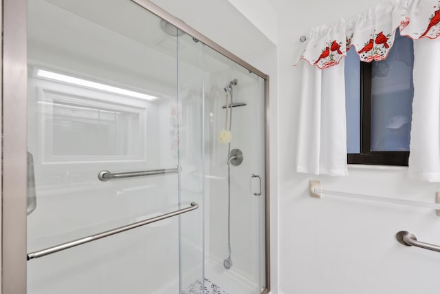 703 Sea Oats Dr Unit A-5, Juno Beach, FL 33408 - bathroom featuring a stall shower
