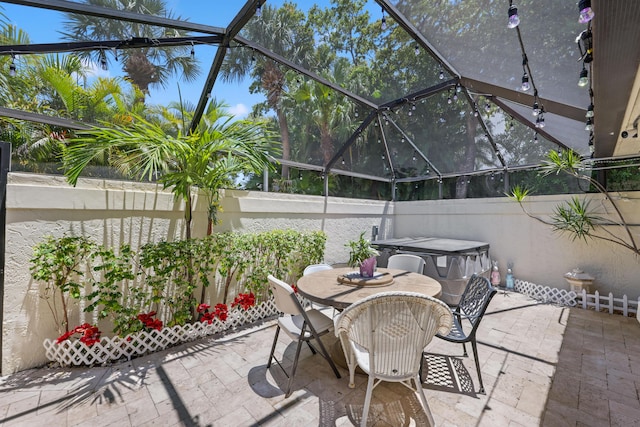 703 Sea Oats Dr Unit A-5, Juno Beach, FL 33408 - view of patio / terrace featuring outdoor dining area and a lanai