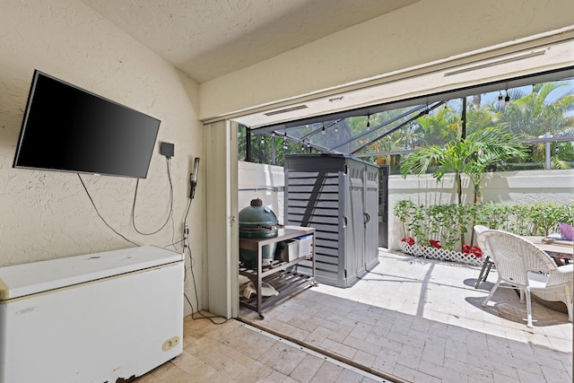 703 Sea Oats Dr Unit A-5, Juno Beach, FL 33408 - sunroom / solarium featuring lofted ceiling