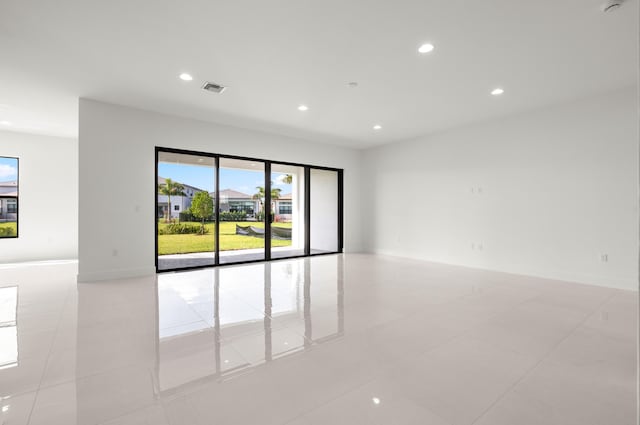 8342 Crystal Downs Ave, Boca Raton, FL 33434 - empty room with recessed lighting, light tile patterned flooring, and baseboards