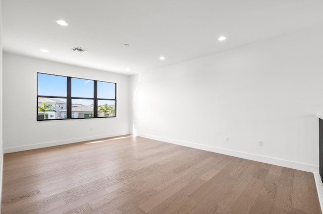 8342 Crystal Downs Ave, Boca Raton, FL 33434 - empty room with light wood-style flooring, recessed lighting, and baseboards
