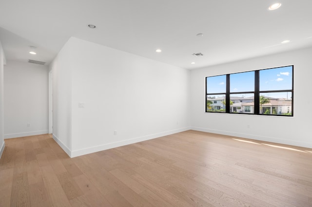 8342 Crystal Downs Ave, Boca Raton, FL 33434 - empty room with light wood finished floors, recessed lighting, and baseboards