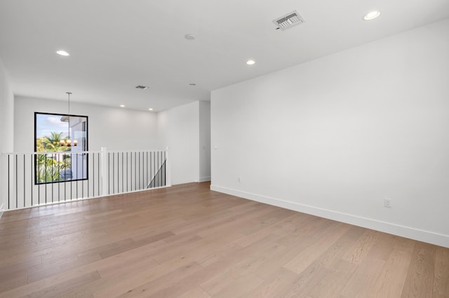 8342 Crystal Downs Ave, Boca Raton, FL 33434 - spare room featuring light wood finished floors, a chandelier, recessed lighting, and baseboards