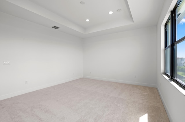 8342 Crystal Downs Ave, Boca Raton, FL 33434 - unfurnished room featuring light carpet, recessed lighting, baseboards, and a tray ceiling