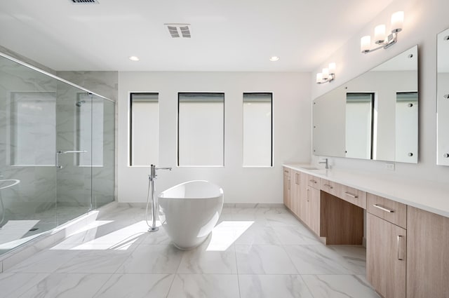 8342 Crystal Downs Ave, Boca Raton, FL 33434 - bathroom with marble finish flooring, baseboards, vanity, a marble finish shower, and a freestanding tub