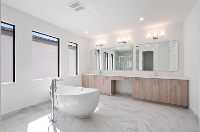 8342 Crystal Downs Ave, Boca Raton, FL 33434 - bathroom with double vanity, marble finish flooring, a shower stall, a freestanding bath, and recessed lighting